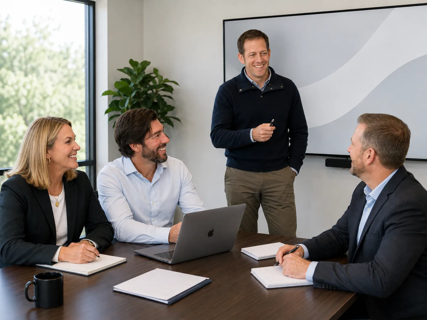 Summit advisors collaborating with a client team